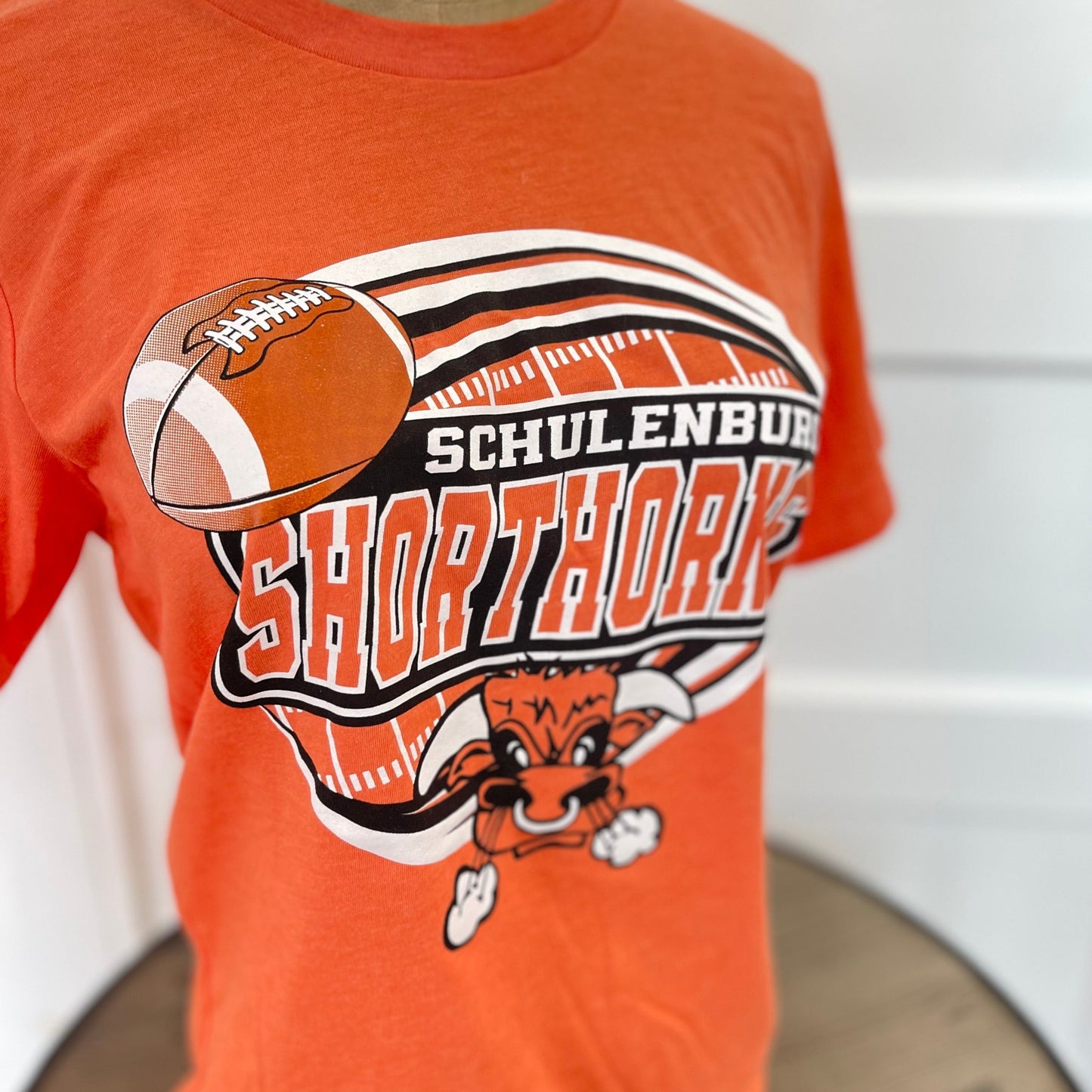 Schulenburg Shorthorns Orange Football Tee | Youth